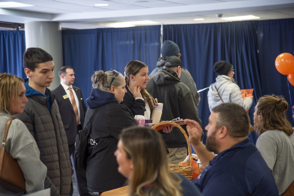 Prospective students gathered in the Concourse to talk with members of the Utica community at a November 2025 Open House event.